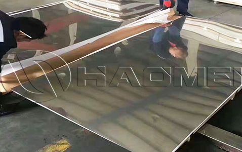 aluminium marine sheet under inspection in workshop.jpg